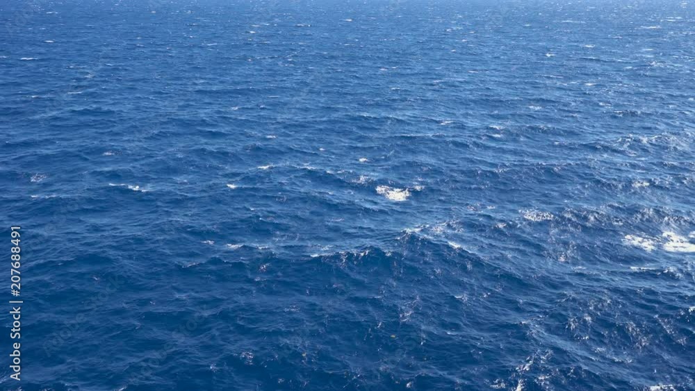 Aerial shot of open ocean. Flight over of open sea. Aerial shot of open ocean. Flight over of open sea.