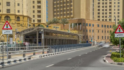 A view of traffic on the street at Jumeirah Beach Residence and Dubai marina timelapse, United Arab Emirates. photo