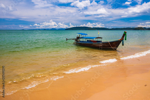 Traditional long tail boat at Ao Nang Beach , Krabi , Thailand © voranat
