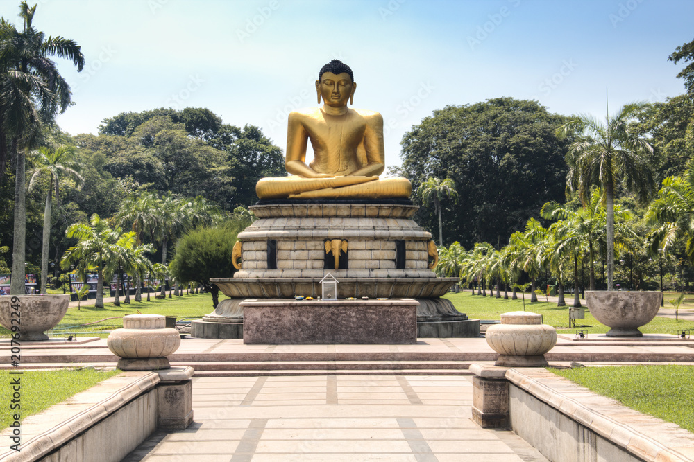 Golden buddha statue in Colombo, Sri Lanka. Golden buddha statue in Colombo, Sri Lanka.