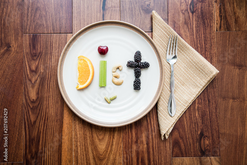 Food spelling Diet with fork and napkin