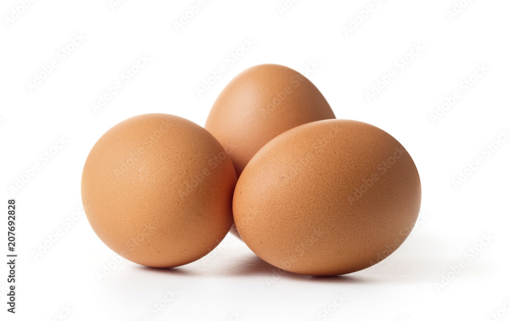 three raw chicken eggs isolated on white background three raw chicken eggs isolated on white background