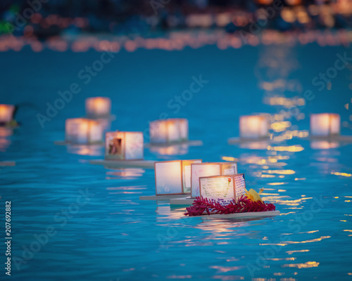 Floating prayer lanterns in water Honolulu, Hawaii 2018