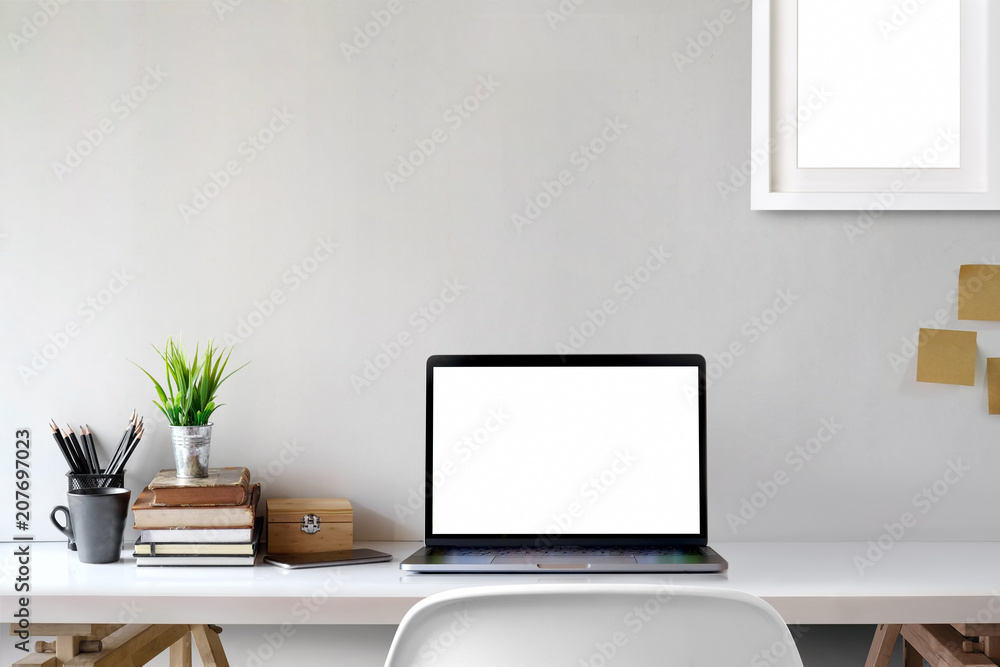 Obraz premium Mock Up workspace, Blank screen laptop and mockup poster at workplace.