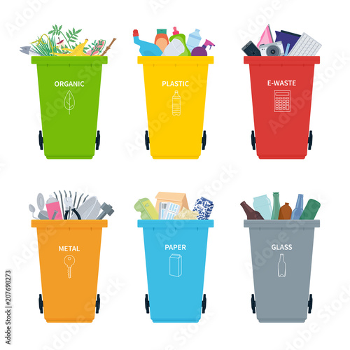 Rubbish bins full of different types of recycling waste.