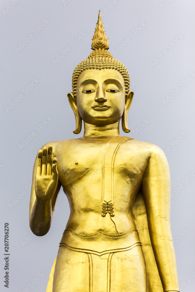 Phra Buddha Mongkol Maharaj tallest Golden Standing Buddha at Hat Yai Municipal Park, Hat Yai Thailand
