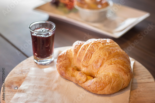 fresh croissants with jam for breakfast