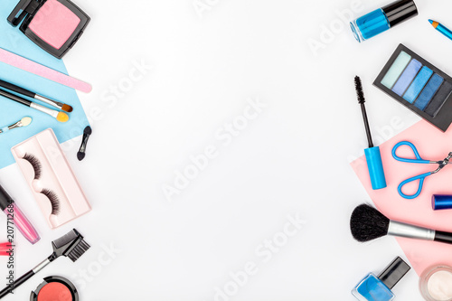 set of professional decorative cosmetics, makeup tools and accessory on white background with copy space for text. beauty, fashion, party and shopping concept. flat lay frame composition, top view