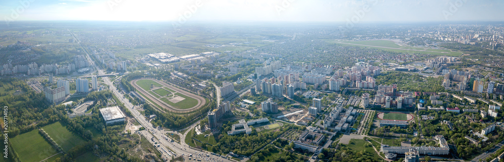 Aerial panoramic view from the drone, a view of the bird's eye view of the city of Kiev, a view of the racecourse and the runway Kiev Sikorsky airport in Zhulyany.