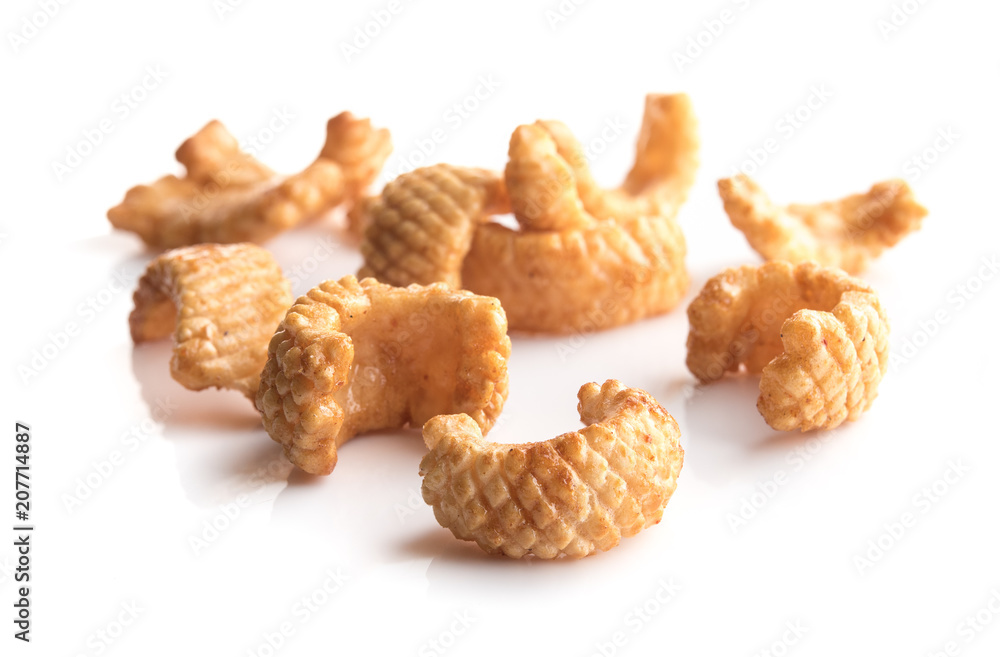 Crunchy corn snacks on a white background Crunchy corn snacks on a white background