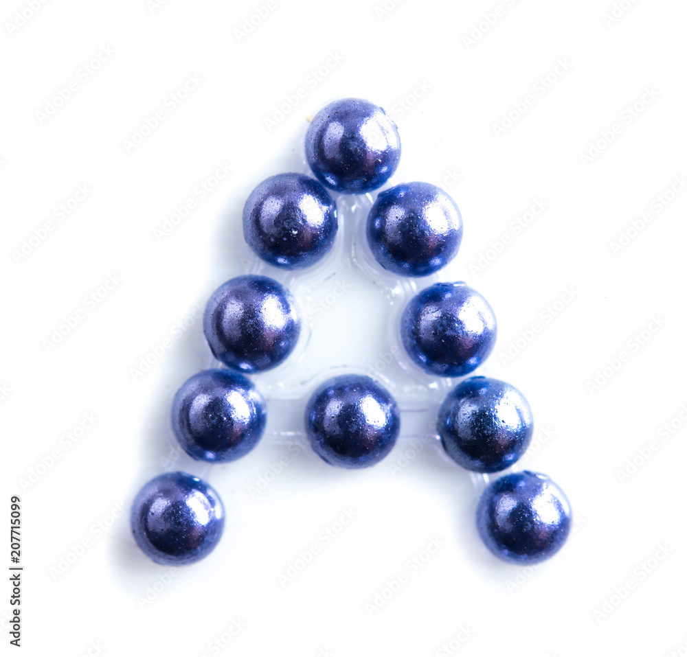 Blue beads font letter of english alphabet on white background Blue beads font letter of english alphabet on white background
