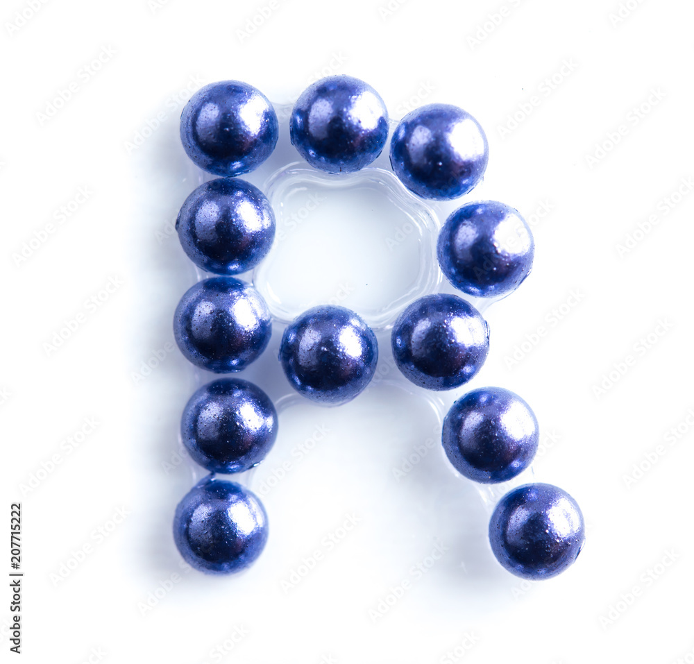 Blue beads font letter of english alphabet on white background Blue beads font letter of english alphabet on white background