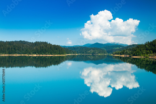 Beautiful mountain landscape in Croatia, Lokvarsko lake with Risnjak mountain in background, reflection, Lokve, Gorski kotar, Croatia © ilijaa