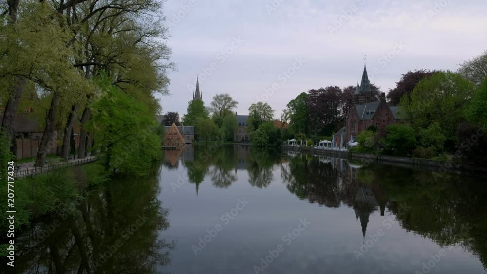 Static clip of Minnewater, in Brugge, Belgium early on a calm spring morning. Static clip of Minnewater, in Brugge, Belgium early on a calm spring morning.