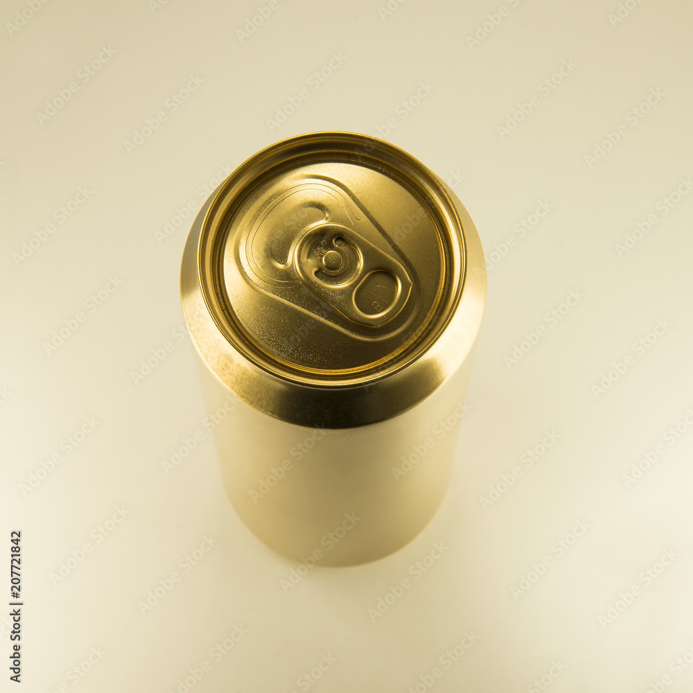 Gold can on white background Gold can on white background