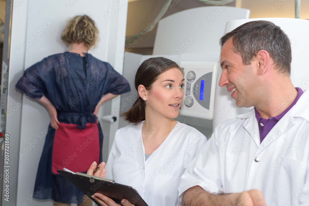 Medical workers in radiology unit Medical workers in radiology unit