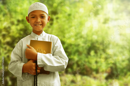 Asian muslim kid smiling