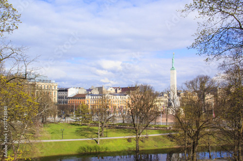 A beautiful view of the Freedom Monument in Vermanes Garden, Riga, Latvia photo