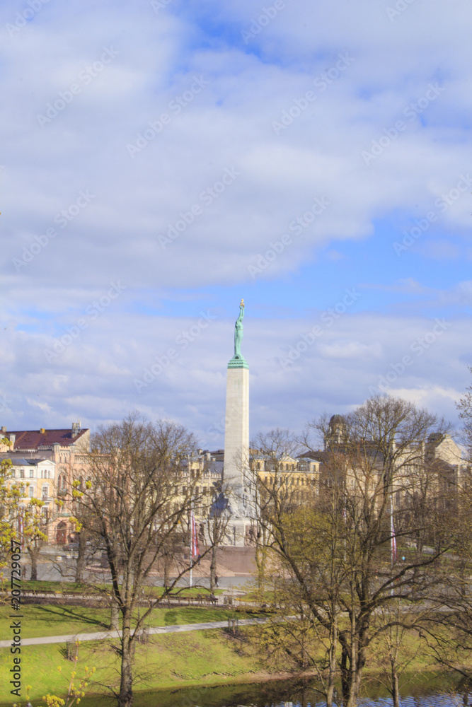A beautiful view of the Freedom Monument in Vermanes Garden, Riga, Latvia