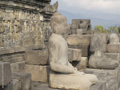 sitting buddha statue Borobodur temple in Java Indonesia photo