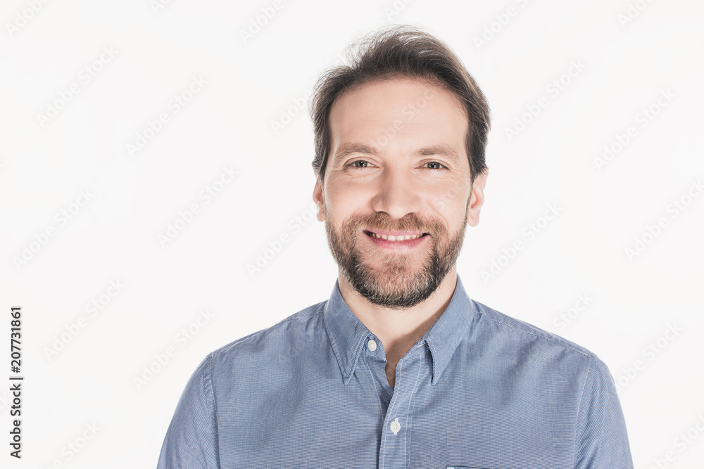portrait of cheerful bearded man looking at camera isolated on white portrait of cheerful bearded man looking at camera isolated on white