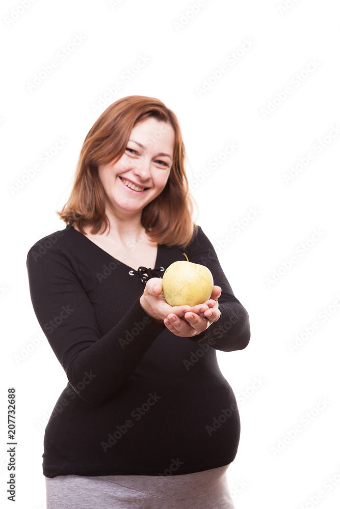 Studio photo og happy smiling woman holding an apple in hands isolated over white background Studio photo og happy smiling woman holding an apple in hands isolated over white background