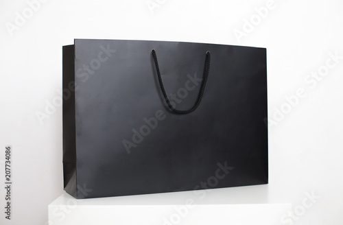 Black blank shopping bag on a white background. Mock up.