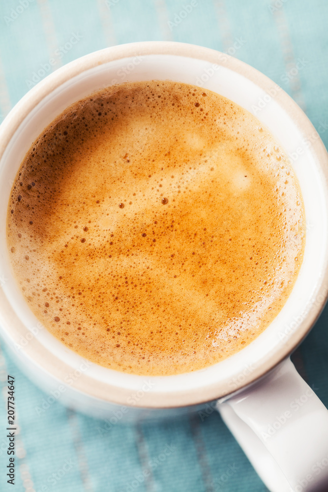 Close up of freshly made cup of coffee Close up of freshly made cup of coffee