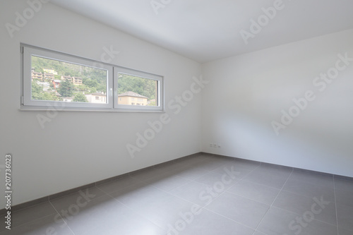 Quadro em tela Empty room and white walls with window with a view