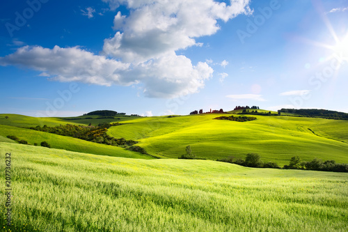 Fényképezés Italy countryside landscape with Tuscany rolling hills ; sunset over the farm la