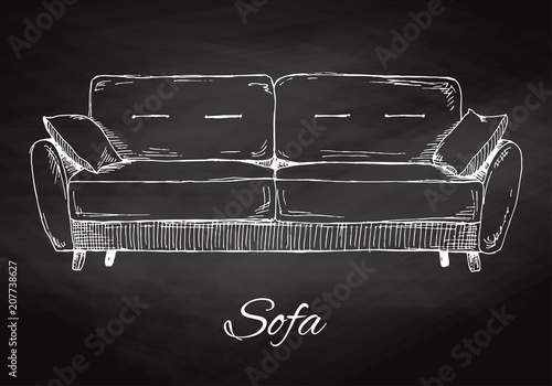 Sofa isolated on chalkboard. Vector illustration in a sketch style