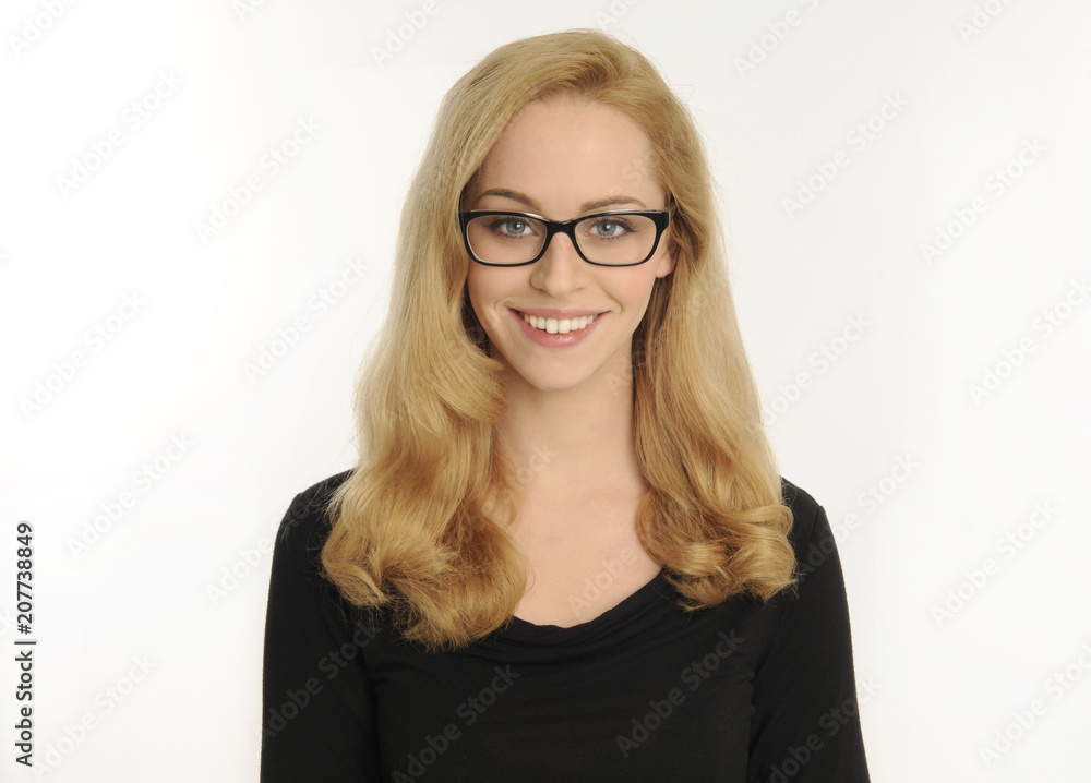 portrait of blonde girl wearing black shirt, on white studio background