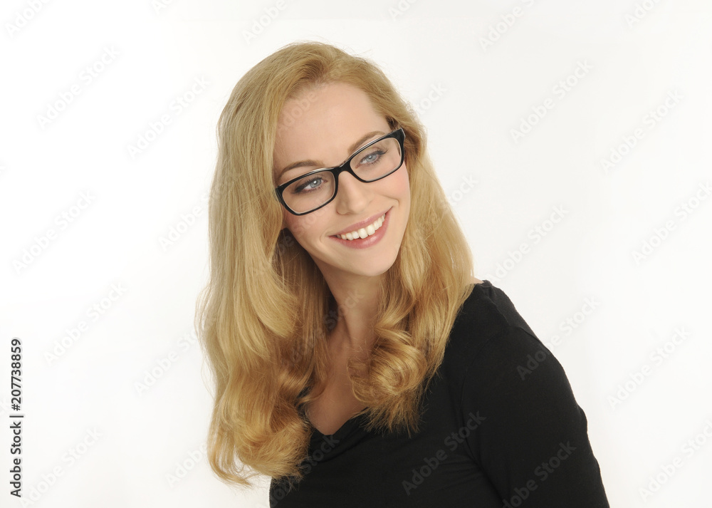portrait of blonde girl wearing black shirt, on white studio background