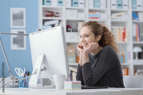 Young woman using a computer in the office