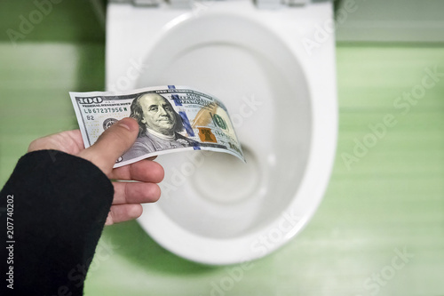 Fotografie concept of senseless waste of money, loss, useless waste, large water costs, 100