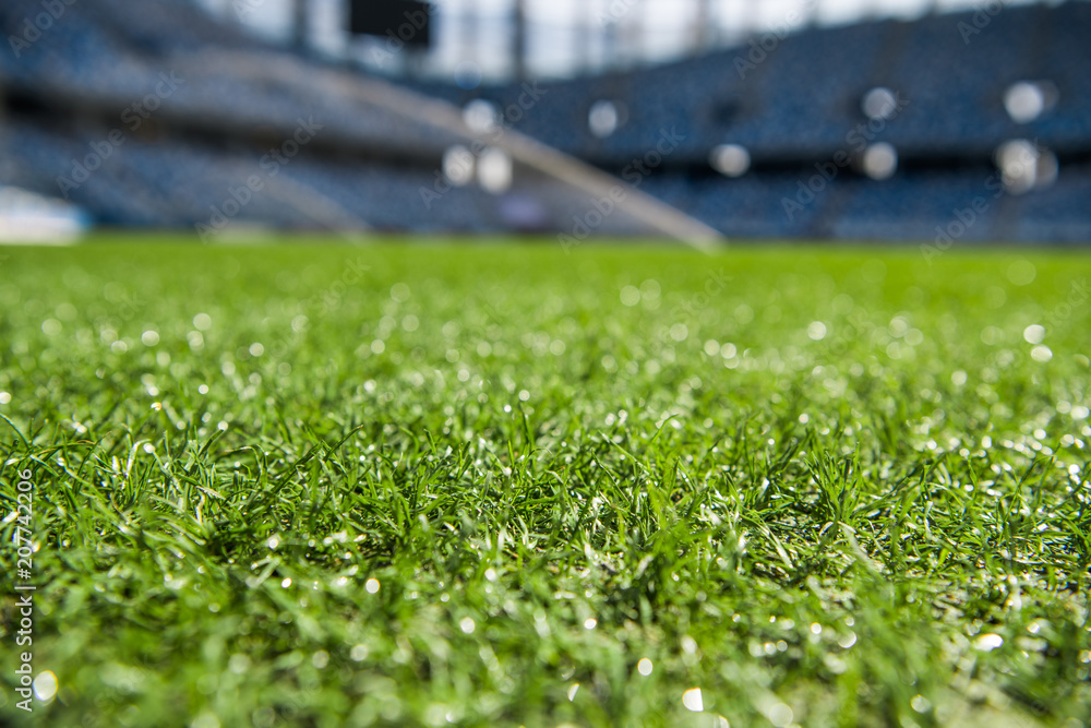 Dew on the artificial grass at empty stadium.