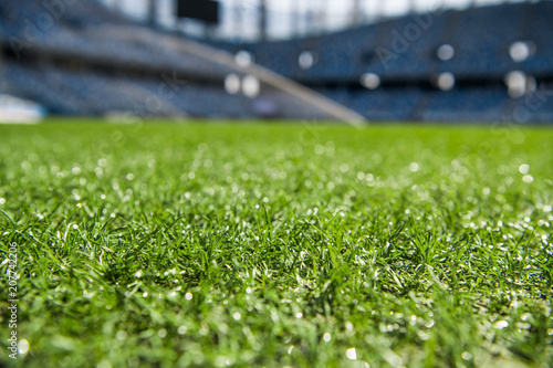 Dew on the artificial grass at empty stadium.