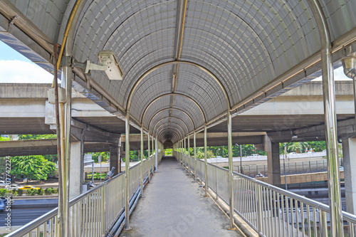 CCTV security hanging on the roof on the overpass in bangkok city.