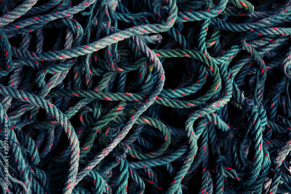 green nylon ropes full of frame as background. vintage look