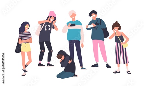 Sad teenage boy sitting on floor surrounded by classmates mocking him, scoffing, taking photos on smartphones. Problem of mockery and bullying at school. Flat cartoon colorful vector illustration.