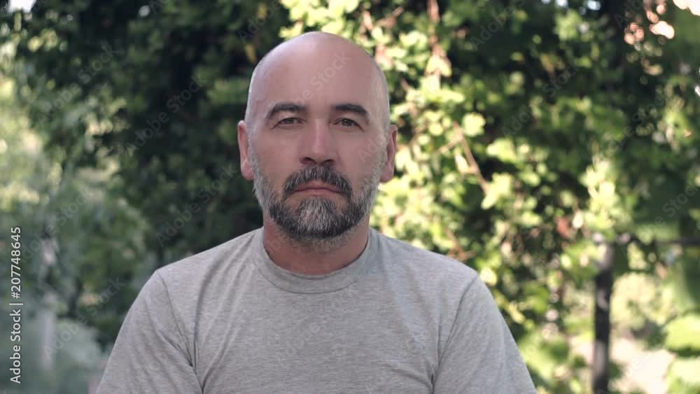 Caucasian man serious face portrait Caucasian man serious face portrait