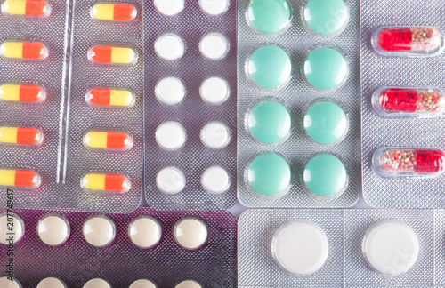 Different colored pills photo