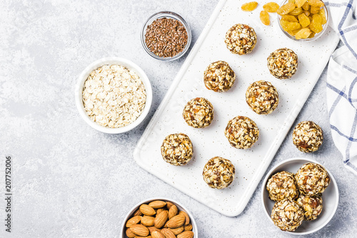 Raw vegan healthy dessert, date and nuts bliss balls, ingredients. Top view, space for text.