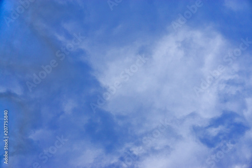 Blue sky with white clouds background;