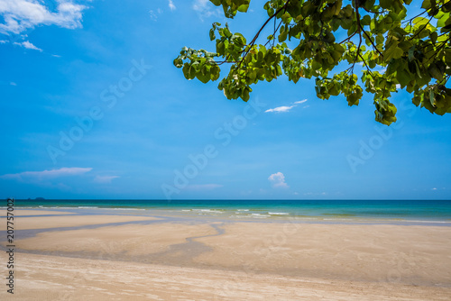 Sand beach and blue sky background © songdech17