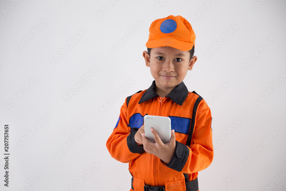 asian little boy with technician, engineer or astronaut uniform asian little boy with technician, engineer or astronaut uniform
