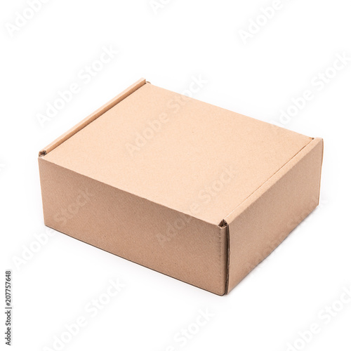 A cardboard box with negative space isolated on white background. © anystock