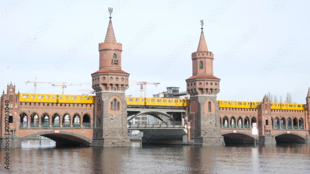 Early morning in Berlin, U-Bahn Crosses the Oberbaum Bridge Early morning in Berlin, U-Bahn Crosses the Oberbaum Bridge