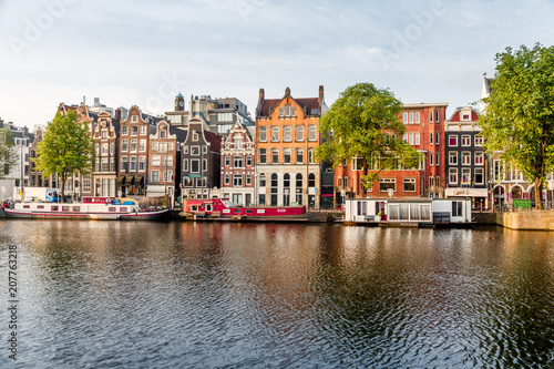 sunrise on the streets and canals of amsterdam