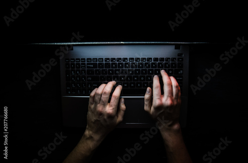 Fototapeta Russian hacker hacking the server in the dark web, Deep Web Top dark net